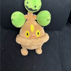 Pokemon Brown and Green Plush Toy